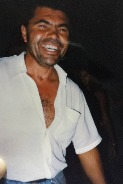 Eugênio sorrindo, de camisa branca — acervo da família